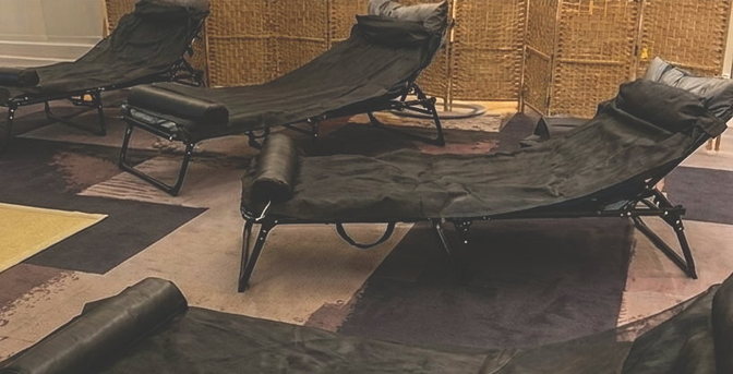 Reclining loungers in the clinic's candlelit community lounge